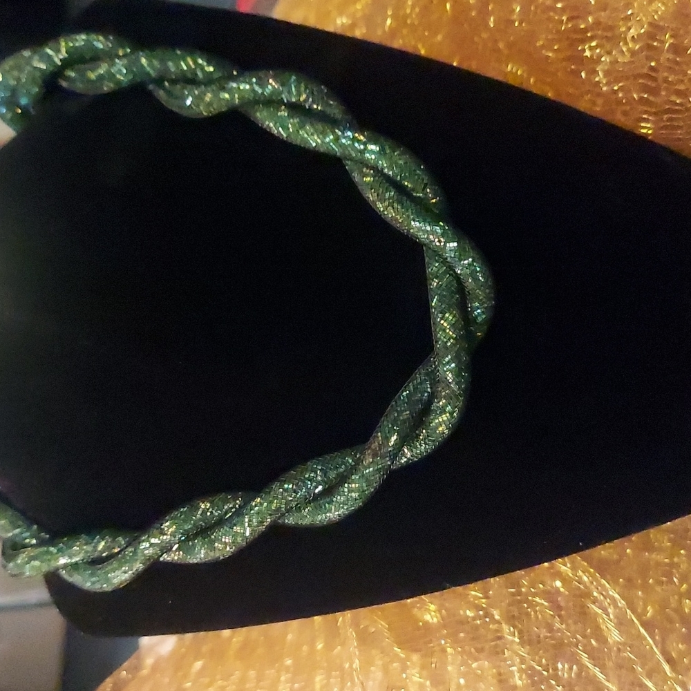 Statement endless twisted sparkle necklace with black rhodium chain.